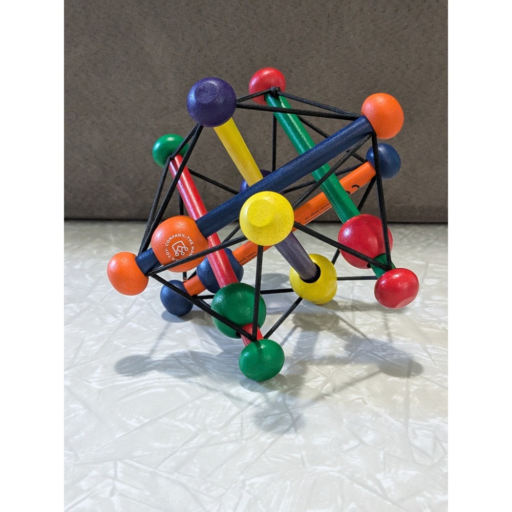 Manhattan Toy Skwish Classic Wooden Rattle and Teether Grasping Activity Toy